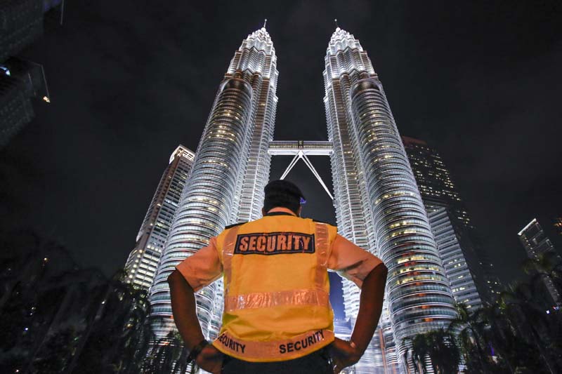Malaysian security at Petronas Twin Towers in Kuala Lumpur.